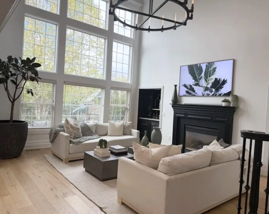 Two-story great room with a wall of windows