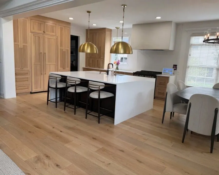 Kitchen island with brass dome pendants